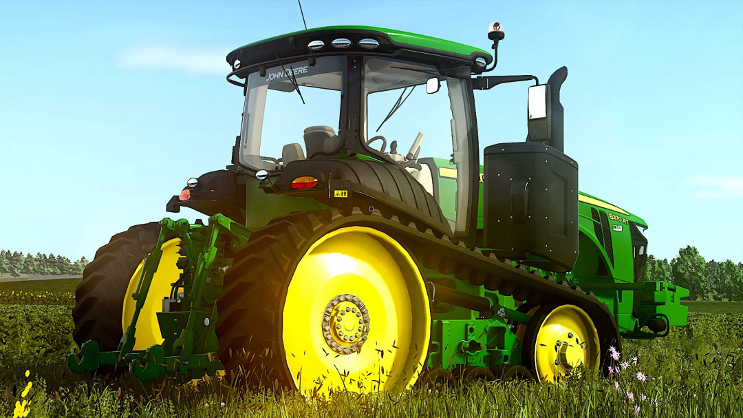 FS25 John Deere 8RT 2018 mod in a field, showcasing its track system and green-yellow design.