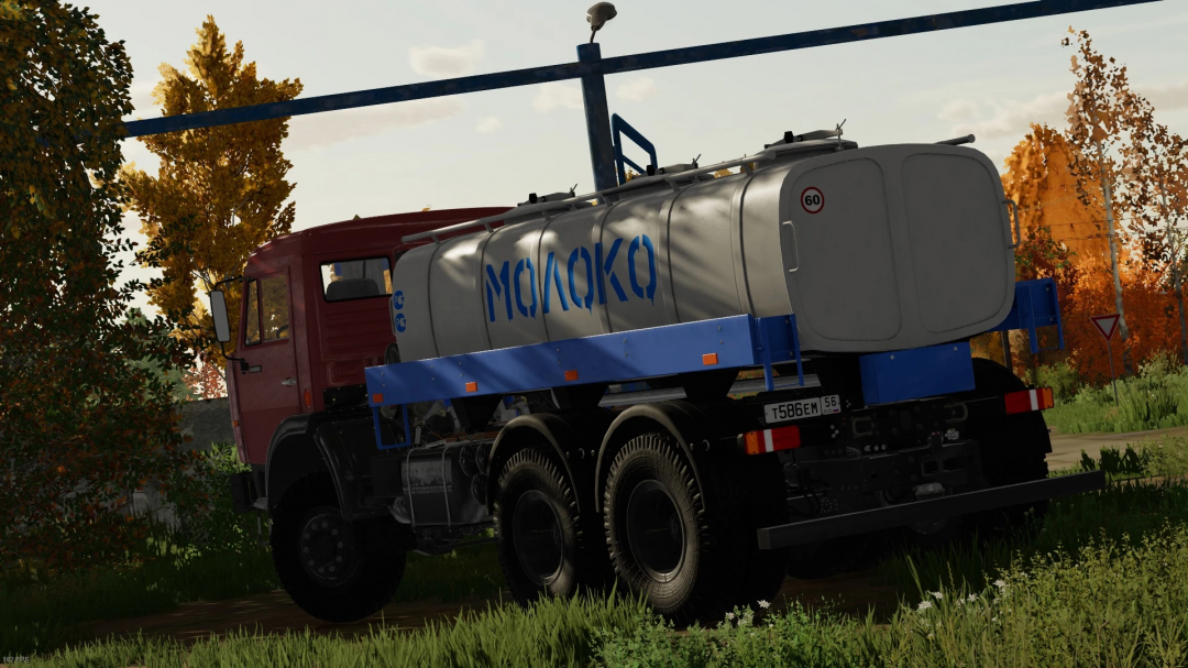 KamAZ-65111 mod for FS22 shown with a milk tanker in a rural setting.