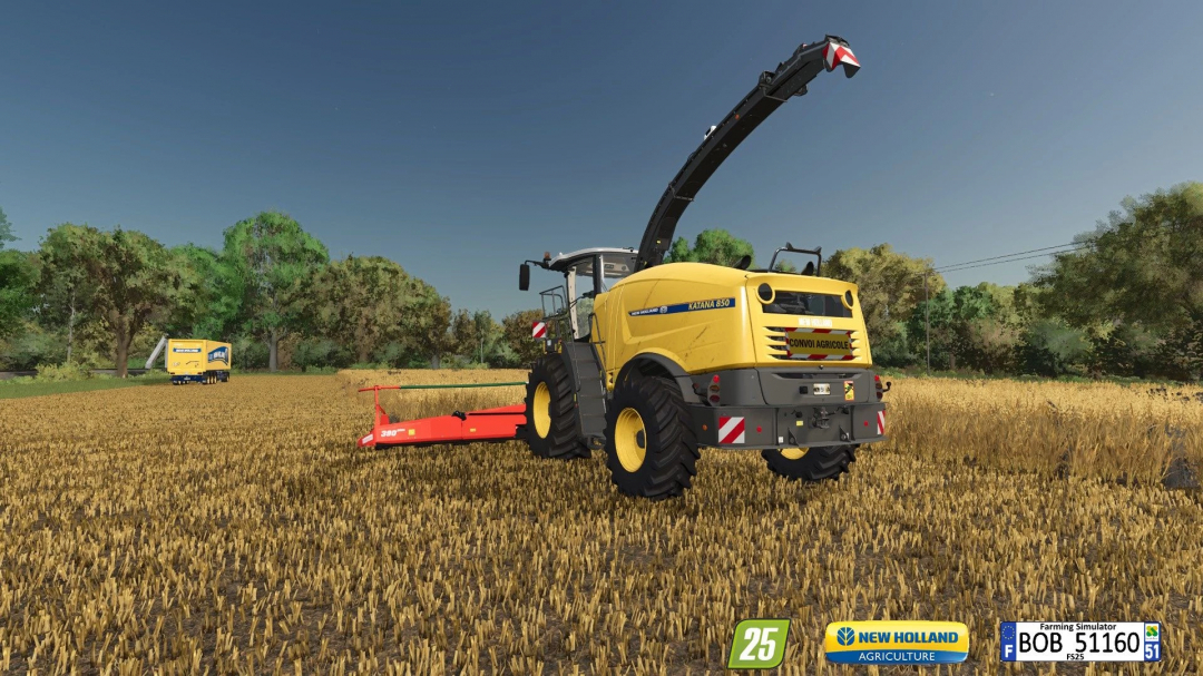 New Holland Katana harvester mod in FS25, working in a field with trees in the background.