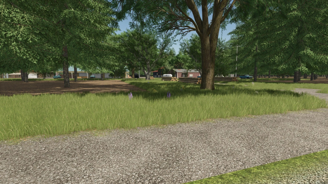 Legacy Township mod v1.0.0.0 for FS25 features a lush rural landscape with trees, grass, and a distant view of buildings.