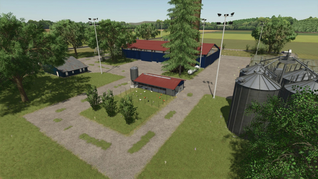 Overview of Legacy Township mod in FS25 featuring farm structures and silos.