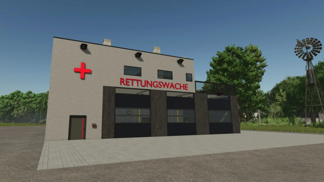 Lifeguard station mod in FS25 featuring a modern rescue building with 'Rettungswache' sign.