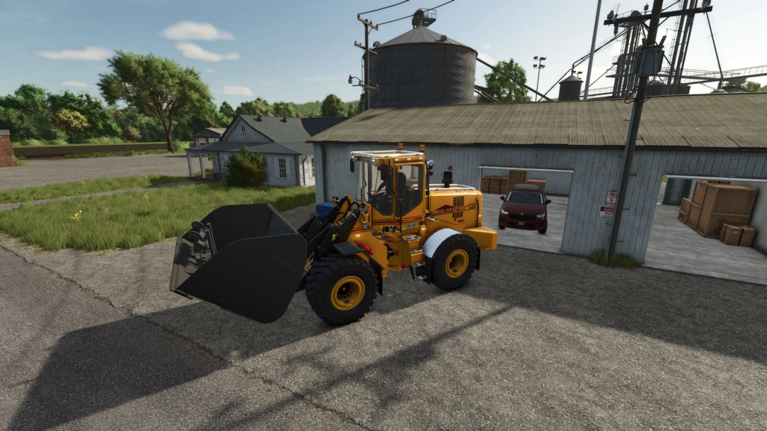 Ljungby Pack v1.0.0.0 in FS25, featuring a yellow loader in a farm setting with silos.