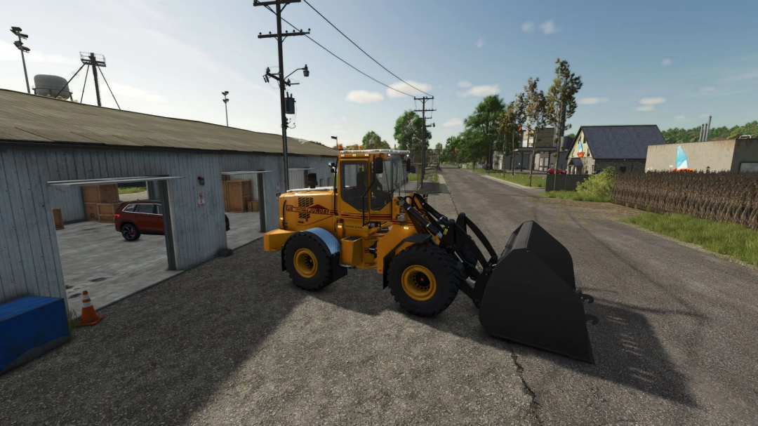 Ljungby Pack mod in FS25 showing yellow loader parked near a building.