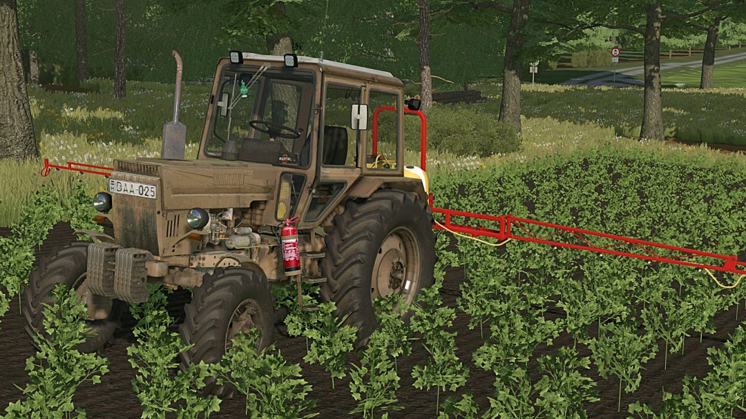 MTZ 82 BARNA tractor mod in FS22, spraying crops in a green field.