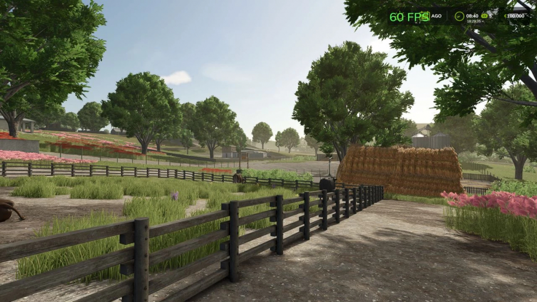 Scenic farm landscape in FS25 mod Terenurile nimanui v1.0.0.0, featuring lush greenery, hay bales, and fencing under a clear sky.