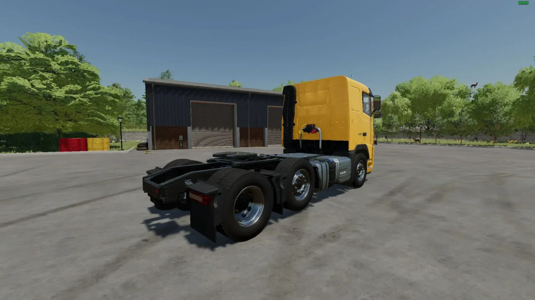 Volvo FH3 6x2 truck mod in FS22 game, parked near a warehouse.