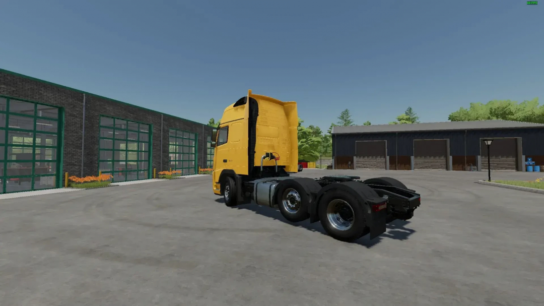 A yellow Volvo FH3 6x2 truck mod for Farming Simulator 22, shown at a garage.