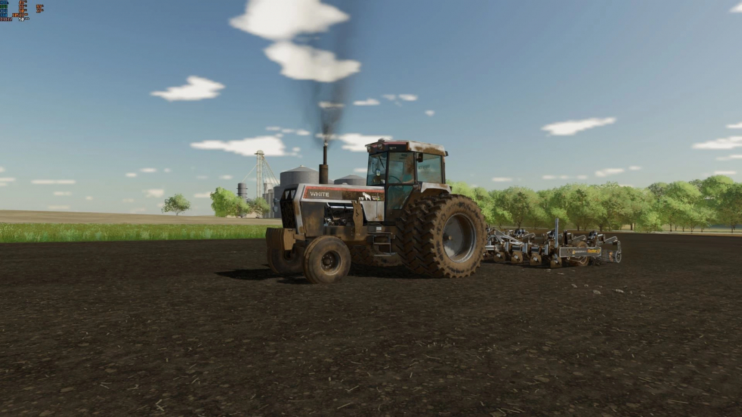 FS22 mod White Workhorse tractor on a farm field in Farming Simulator 22.