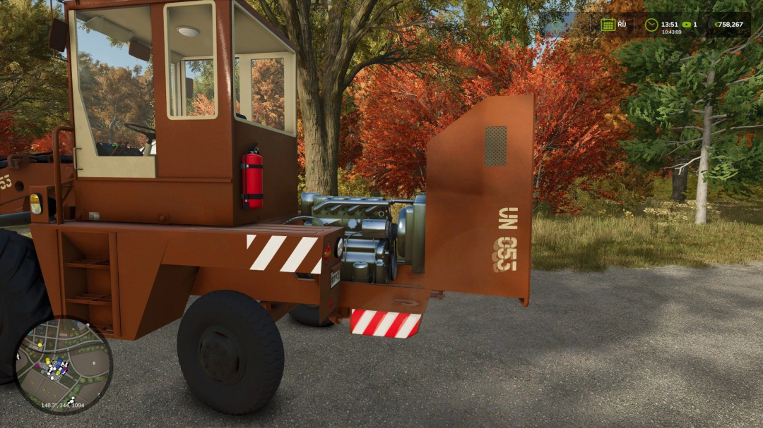 ZTS UN-053 Pack mod in FS25, displaying a detailed view of the vehicle against an autumnal backdrop.