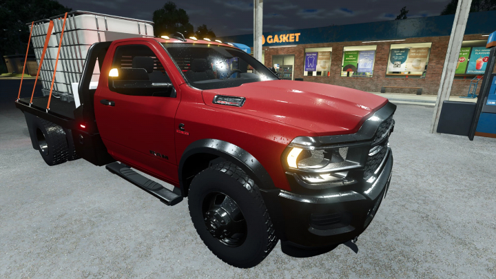 fs25-mods,  Dodge Ram 5500 v1.4.0.0 mod in FS25, featuring a red truck with flatbed and container, parked at a gas station.