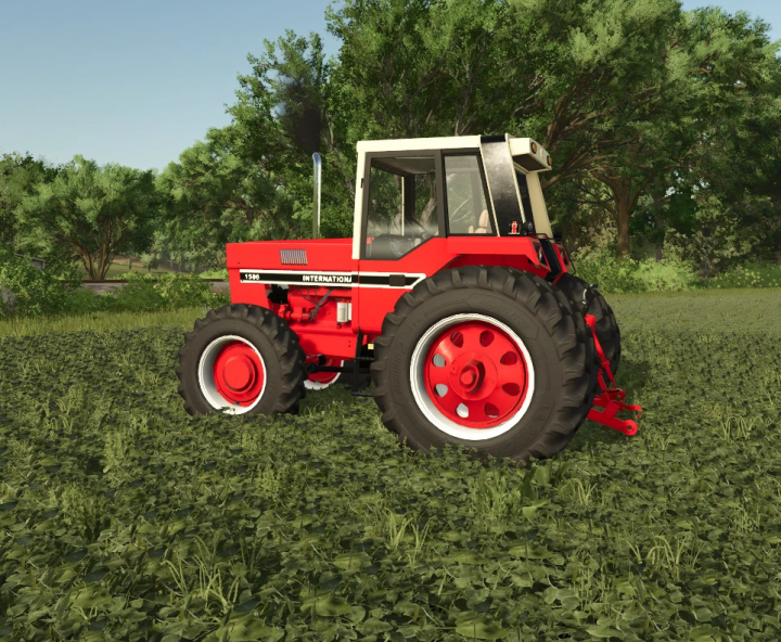 fs25-mods,  International 86 Series tractor mod in FS25 on a field with trees in background.