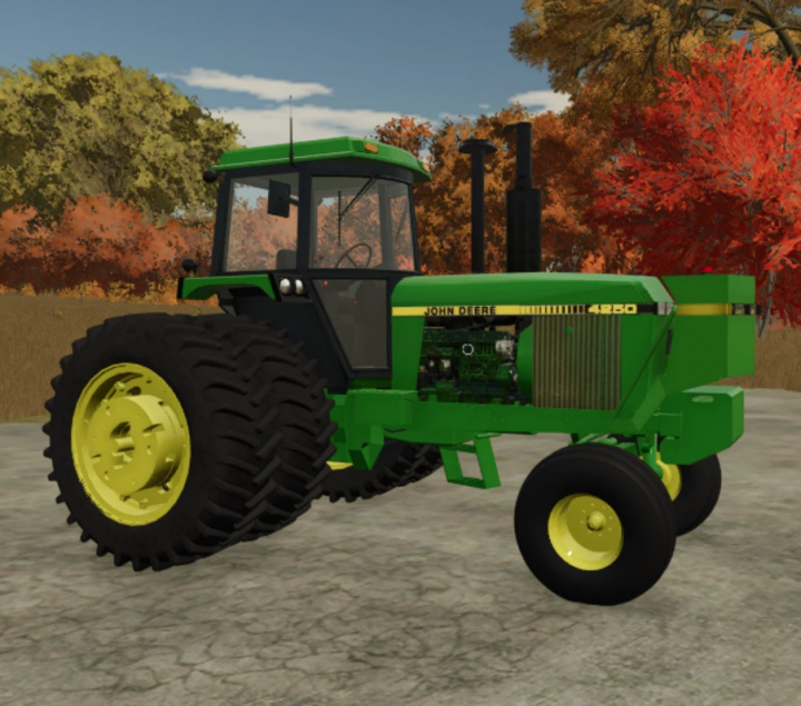 fs25-mods,  John Deere Series 55 tractor mod in Farming Simulator 25, featuring autumn trees in the background. FS25 mods.