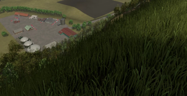 fs25-mods,  Aerial view of a farm in FS25 mod Kaprun v2.1.2.0, showing buildings and grassland.