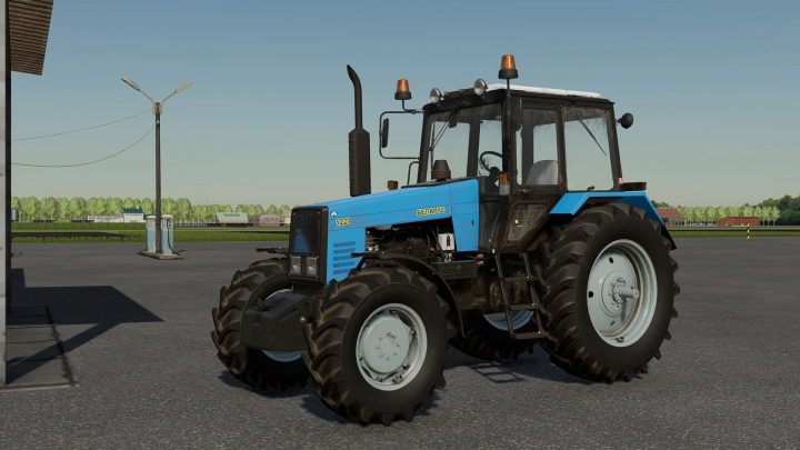 fs22-mods,  MTZ-1221 tractor mod for FS22 with update v1.0.0.0 in Farming Simulator 22, showcasing a blue tractor on a concrete surface.