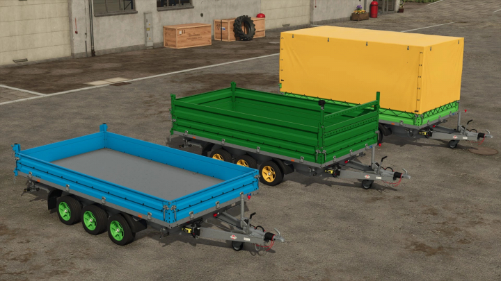 fs25-mods,  Stema Trius Trailer mod in FS25 showing three different colored trailers parked on concrete.