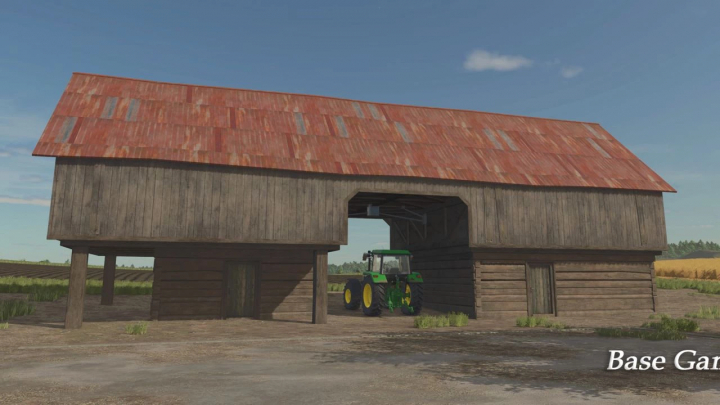 fs25-mods,  FS25 mod The Updated Hayloft v1.0.0.1 features a rustic barn with a tractor inside, enhancing Farming Simulator 25 gameplay.