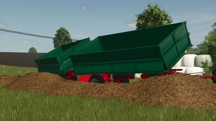 fs25-mods,  Zmaj 489 green trailers unloading hay in FS25 mod.