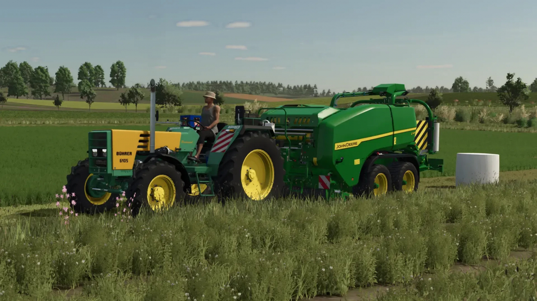 FS25 mod Bührer 6105 Series v1.0.0.1 tractor with John Deere baler on a field