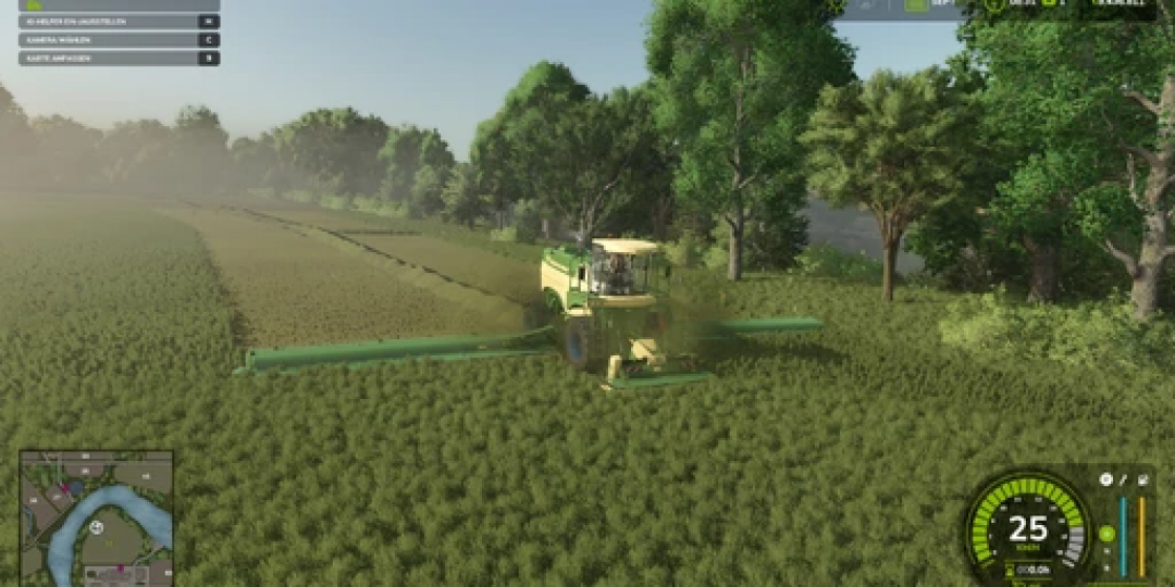 FS25 mod Big M XL by Arthur W mowing a field, showcasing Farming Simulator 25 gameplay with lush greenery.