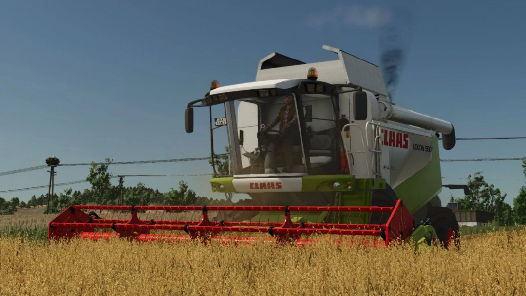 CLAAS Lexion 500 harvester in FS25 mod, working in a wheat field.