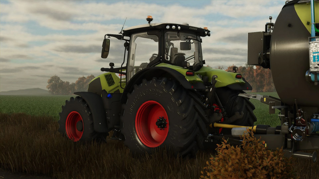 FS25 mod Claas Axion 800 tractor in field, showcasing detailed graphics in Farming Simulator 25.