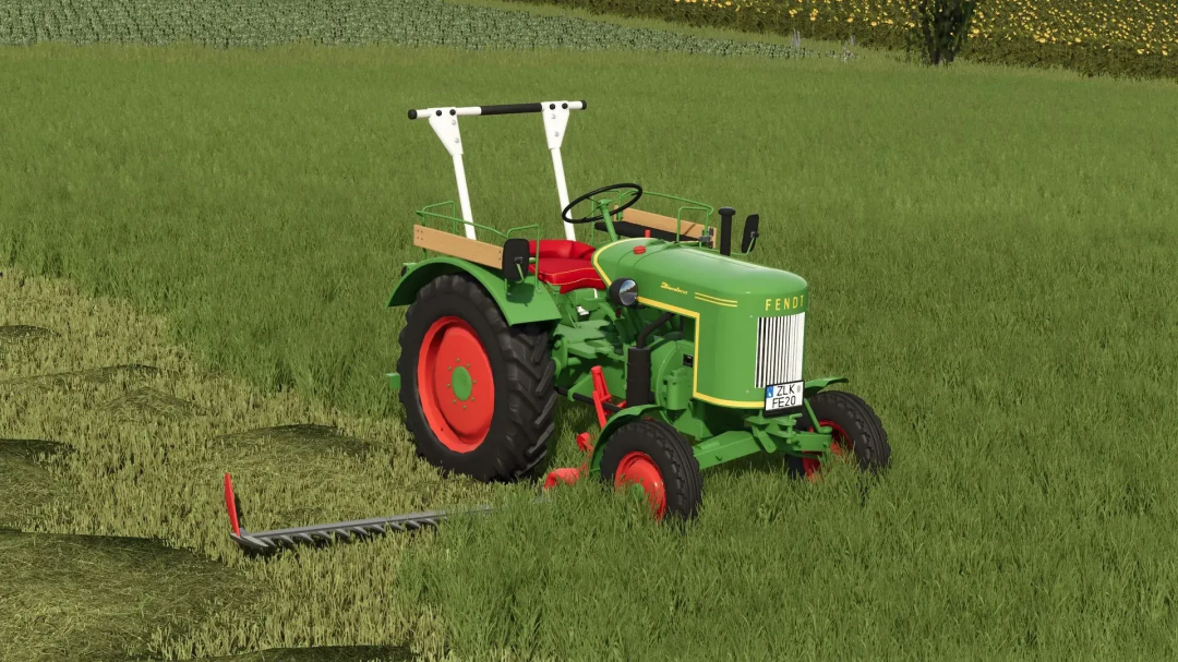 Farming Simulator 25 mod Eicher Cutterbar v1.0.0.0 shown with green tractor in a lush field.