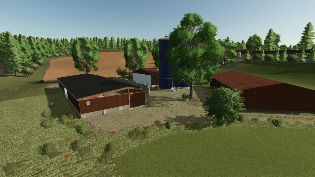 FS25 mod FBM25 Sonnental v1.0.0.0 featuring a detailed farm with silos, barns, and fields under a clear sky.