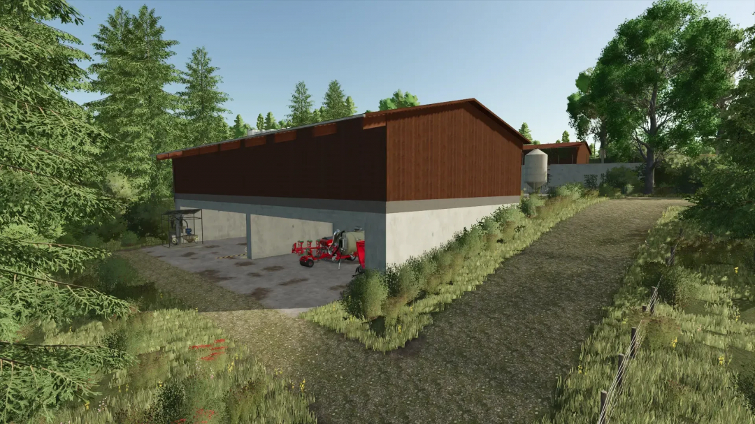 FS25 mod Sonnental v1.0.0.0 showing a wooden barn surrounded by trees and farm equipment.