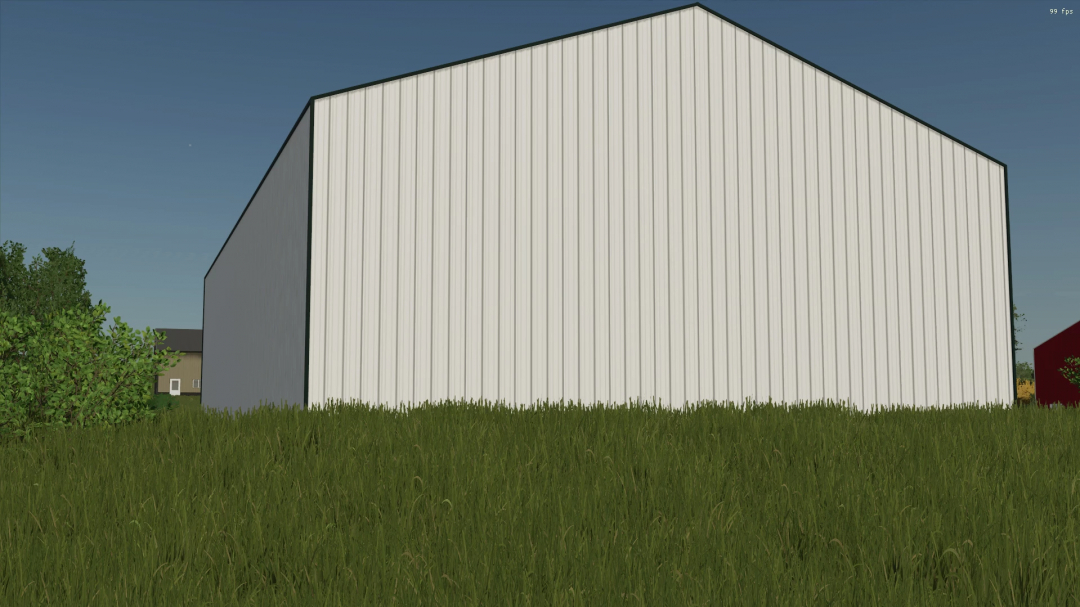 FS25 40x70 Shed mod v1.0.0.0 in Farming Simulator 25. The white shed stands in a grassy area under a clear sky.