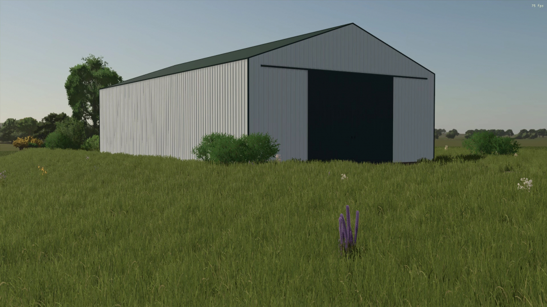 FS25 40x70 Shed mod showcased in a grassy field for Farming Simulator 25.