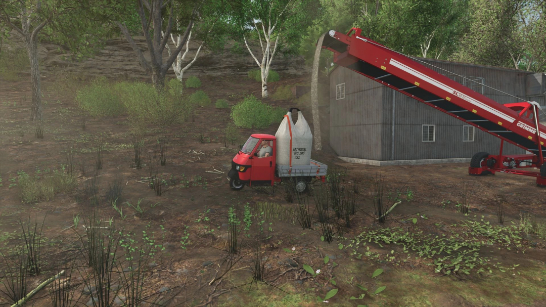 A red vehicle transports a Fillable Big Bag in Farming Simulator 25, showcasing the FS25 mods in a forested area.