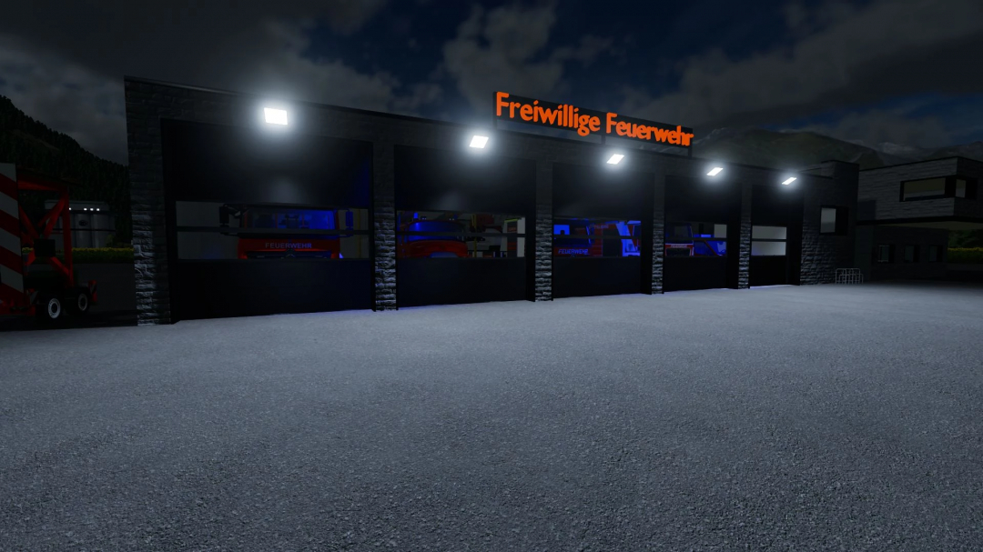 FS25 mod Fire Station v1.0.0.0 at night with fire trucks inside, illuminated sign reading 'Freiwillige Feuerwehr'.