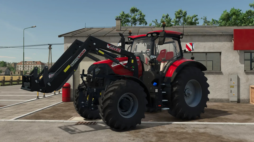 Red tractor with frontloader in Farming Simulator 25 Frontloader Pack mod.