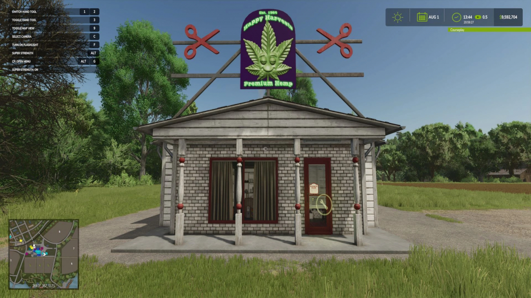 FS25 mod screenshot of the Hemp Production System v1.2.0.0 building, featuring a brick facade and hemp-themed sign.