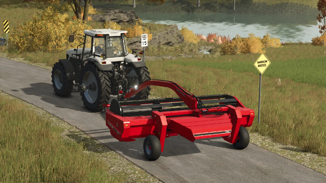 FS25 mod showing a tractor towing the International 1490 mower conditioner on a country road.