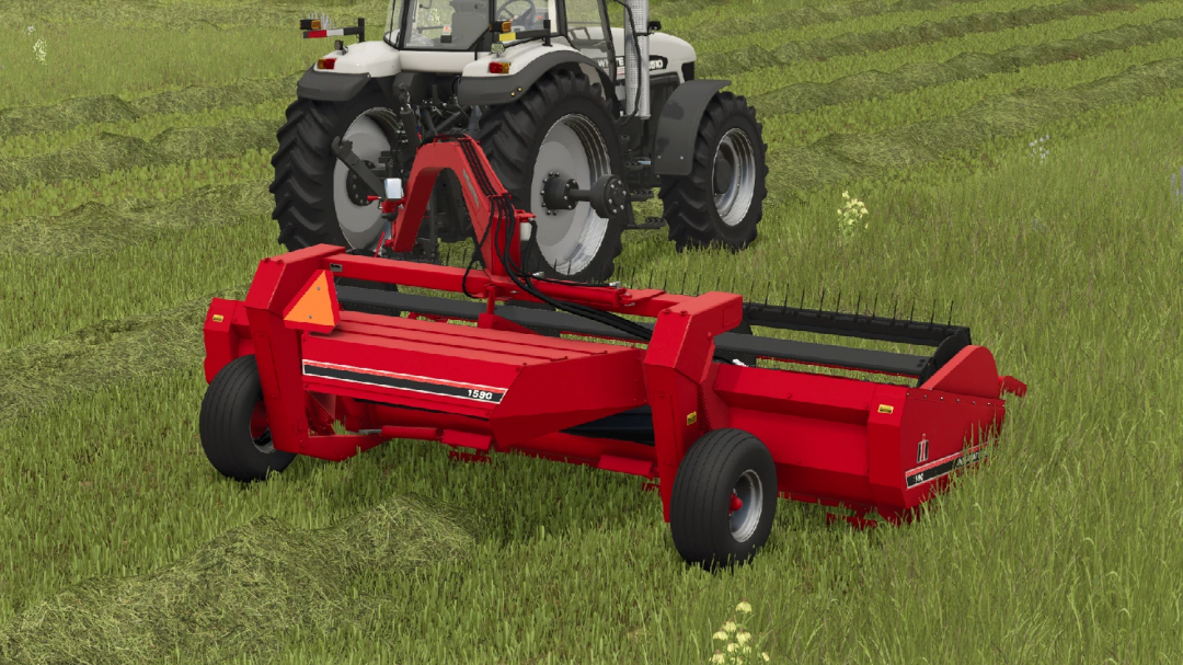 FS25 mod: International 1590 Mower Conditioner attached to a tractor cutting grass in Farming Simulator 25.