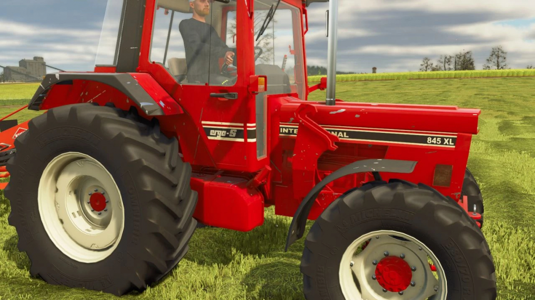 Red International IH 845XL tractor mod in FS25 on a field.