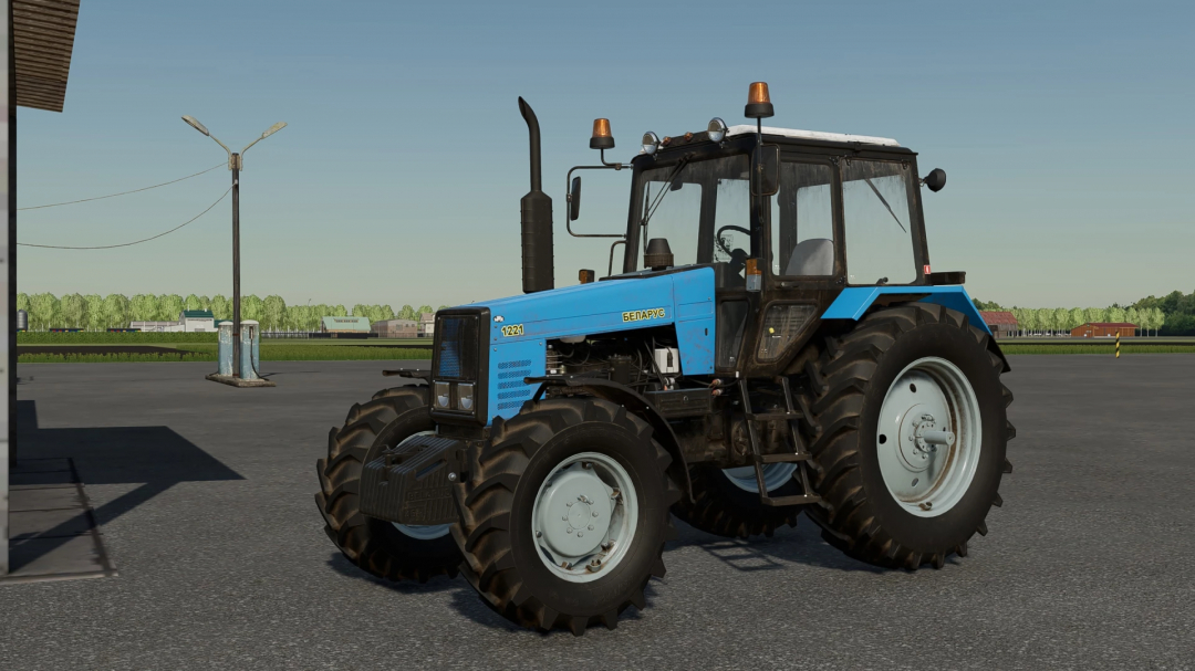 MTZ-1221 tractor mod for FS22 with update v1.0.0.0 in Farming Simulator 22, showcasing a blue tractor on a concrete surface.