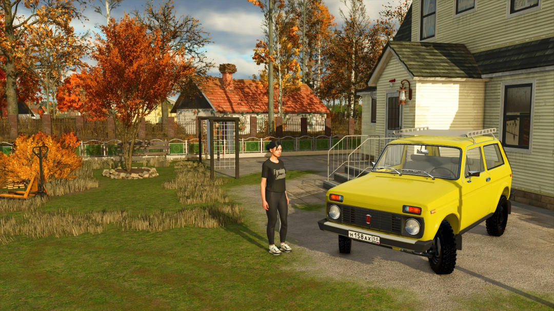 A yellow NIVA 4X4 in FS25 mod parked by a house with autumn foliage.