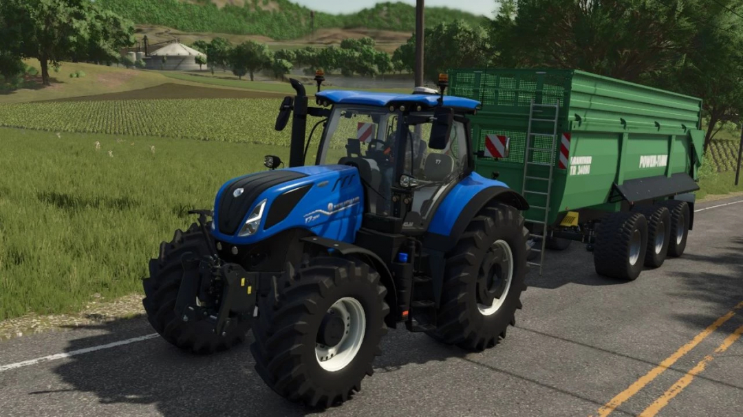 New Holland T7 tractor from FS25 mods in a field with green trailer. Farming Simulator 25 mod New Holland T7 Open Pipe Sound v1.1.0.0.