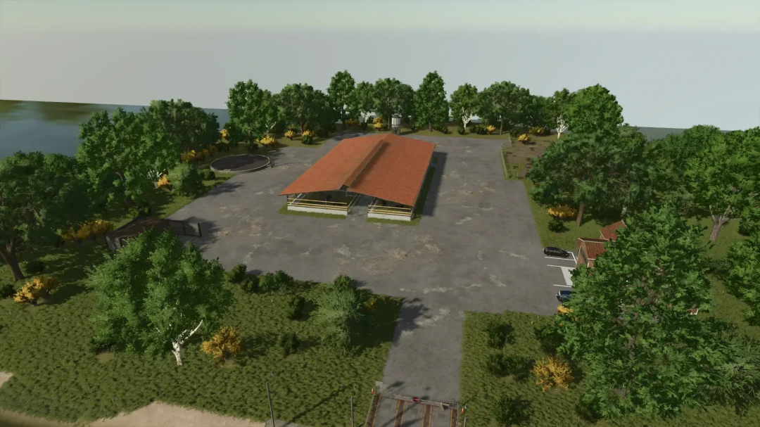 FS25 mod Norddeutsche Insel v1.0.0.0 featuring a farm with a red-roofed barn surrounded by trees.