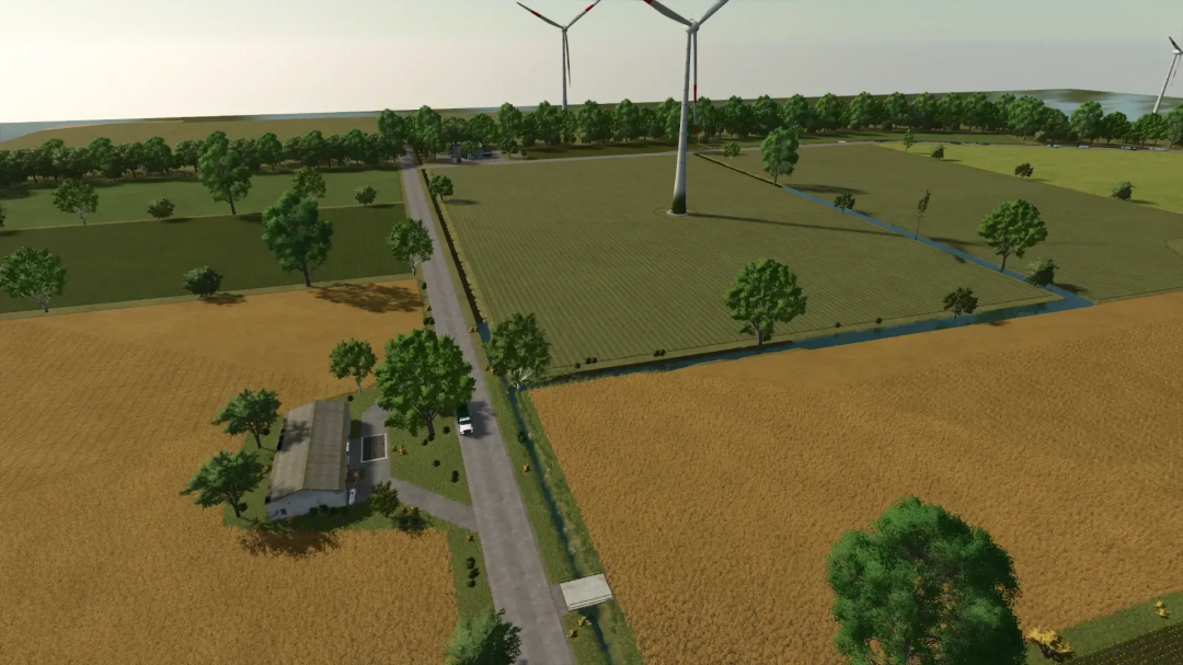 Aerial view of Norddeutsche Insel in FS25 mod showing wind turbines, fields, and trees.