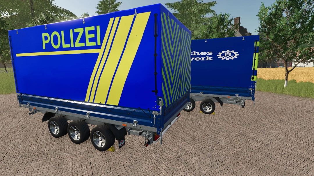 FS25 mod Police trailer deployment v1.0.0.0 showing blue and yellow police trailers in a farm setting.