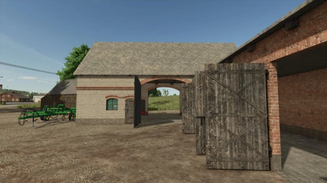 FS25 mod Small Building With Garage v1.0.0.0, featuring a rustic brick garage with wooden doors and farming equipment in Farming Simulator 25.