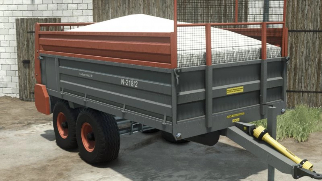 Warfama N218 trailer mod in FS25, featuring a grey and red color scheme. Enhances Farming Simulator 25 gameplay.