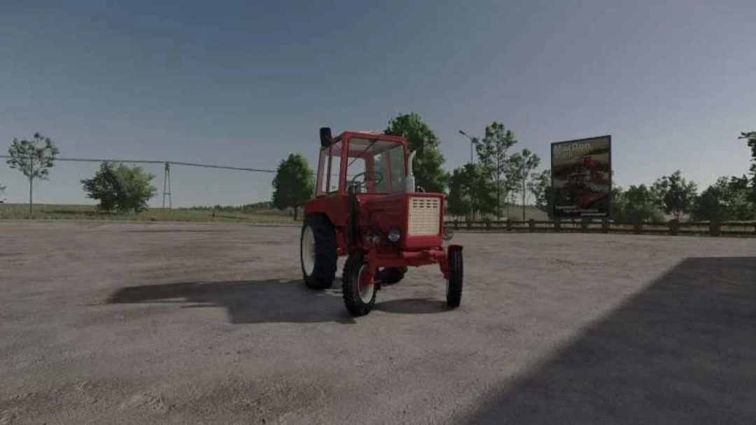 Red Wlademirec T25 tractor parked in an open lot in Farming Simulator 25 mod.