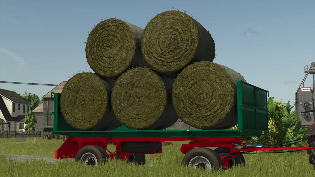 Zmaj 489 Farma kanas trailer loaded with hay bales in FS25 mod.