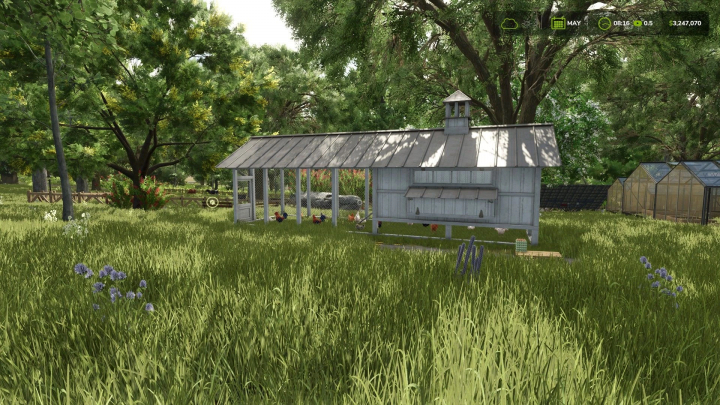 fs25-mods,  FS25 mod Eggs Box 360 v1.0.0.0 showing a chicken coop in a grassy area with trees and greenhouses, ideal for Farming Simulator 25.