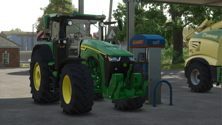 fs25-mods,  FS25 mod Realistic Refueling v1.0.0.0 shows a green tractor at a gas station in Farming Simulator 25.